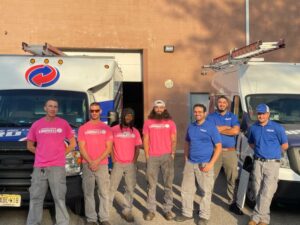 Cardwell Team in Breast Cancer Awareness Shirts